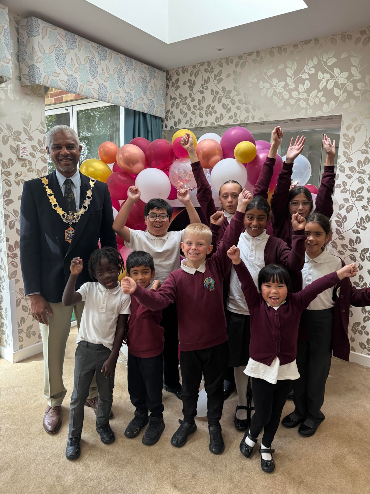 Mayor Cllr Glenn Dennis with children from The Palmer Academy