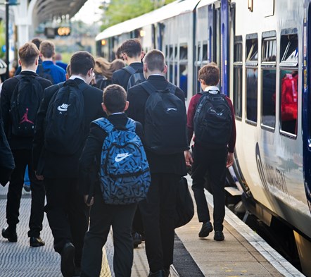 Image shows schoolchildren disembarking a Northern train