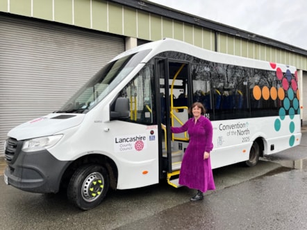 Cllr Phillippa Williamson with a Convention branded minibus