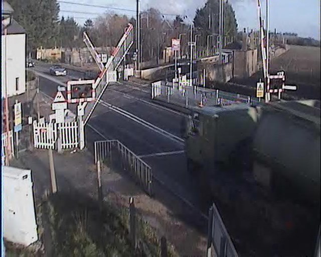 Tanker driver runs the risk at Foxton crossing, Cambs (1)