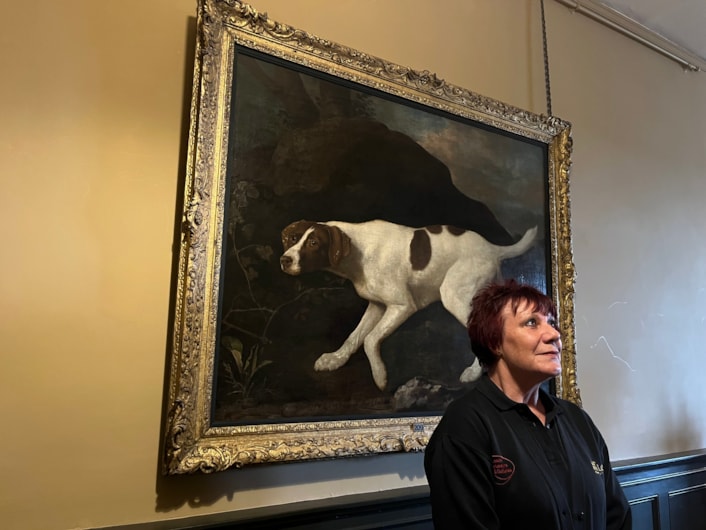 Pet portrait: Visitor assistant Deborah Crossley with the beautiful oil painting of Lord Clermont’s faithful canine companion, which has gone on display to visitors for the first time in a number of years, following a loan spell at Wentworth Woodhouse in Rotherham.

Painted by celebrated artist George Stubbs in 1772, the portrait of Phillis was commissioned by her owner William Henry Fortescue, Lord Clermont, a keen sportsman who kept a sizeable kennel, but who was known to be particularly fond of Phillis.