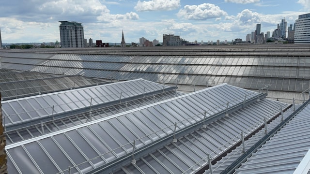 ON TRACK: London Waterloo roof upgrade approaches halfway mark as station celebrates its 177th birthday: Old and New side by side - the leftward panes are yet to be completed, the rightward panes have