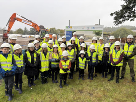 Back row, left to right: Karen Greaves, Chief Executive of Moray Council; Richard Park, Chief Executive of hub North Scotland; Cllr Paul McBain, Forres ward member; Jan Sinclair, Head Teacher of Forres Academy; Atholl McKay, Balfour Beatty (Scotland) Portfolio Manager; Edward Thomas, Head of Housing