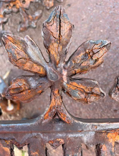 Corroded ironwork from shelter - before