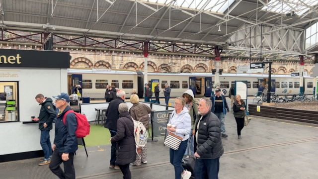 Passengers walking through Crewe Sation October 2026
