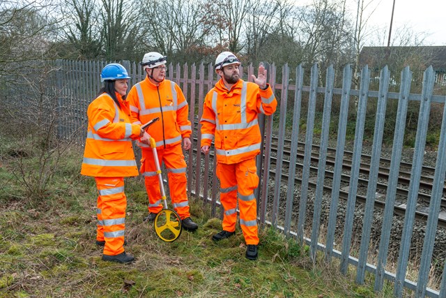 Network Rail staff carrying out survey work on the Aldridge station site: Network Rail staff carrying out survey work on the Aldridge station site