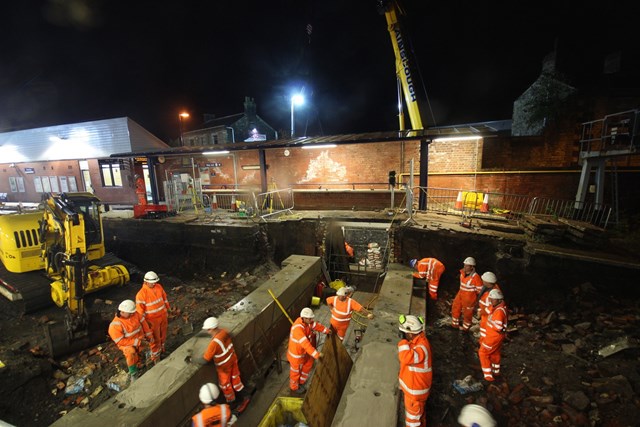 The orange army working overnight to replace the subway at Chorley station