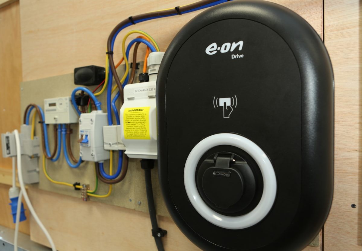 Electric vehicle (EV) charging equipment at E.ON's Net Zero Training Academy in Kingswinford, UK. The device is used to teach trainees and apprentices on how to install E.ON Drive EV chargers in customers homes across the UK.