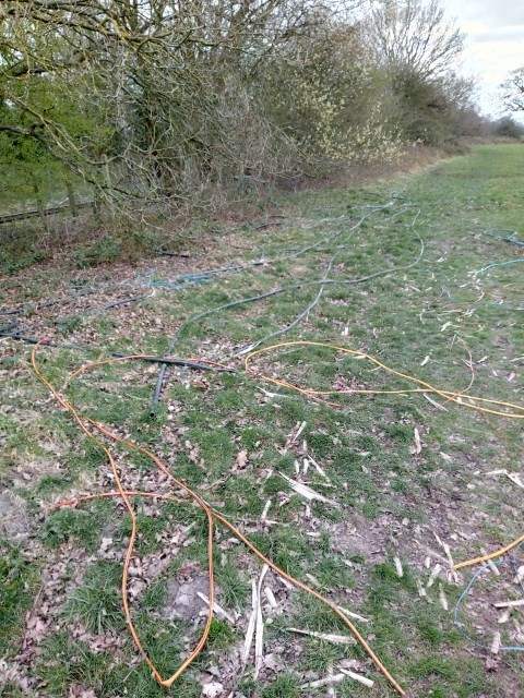 Discarded cable sheathing after metal thieves stripped out the copper wires from railway signalling in Cheshire