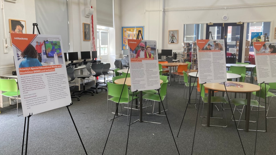 Four displays summarising the first four priorities of the new Education Strategic Plan as presented during a consultation event in 2025 in one of the Hackney schools' libraries