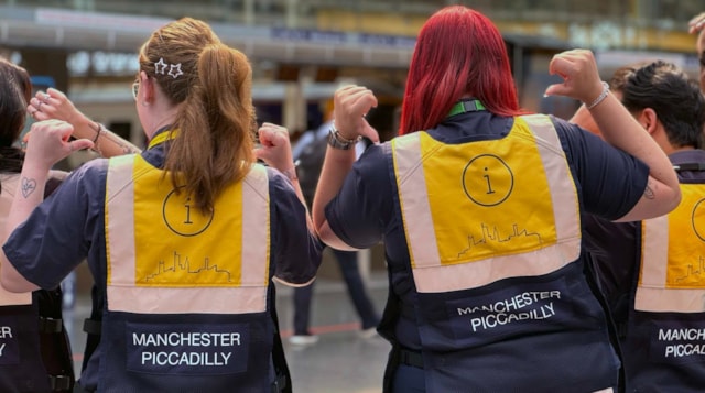Staff in yellow vests - Manchester Piccadilly1: Staff in yellow vests - Manchester Piccadilly1