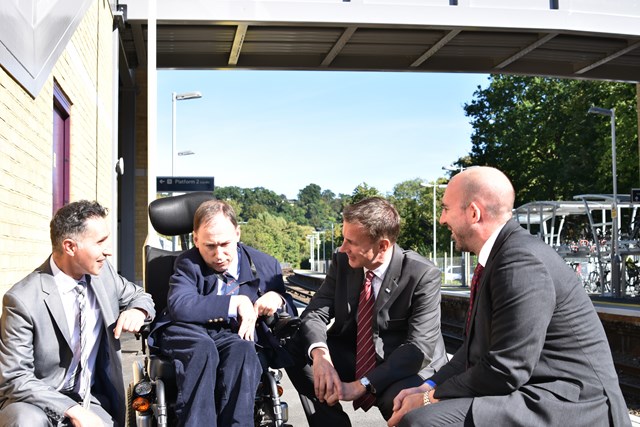 Stuart Kistruck, route managing director of Network Rail's Wessex route, Jeremy Hunt MP and Andrew Crawte, a local campaigner for disabled access discuss the benefits of the new accessible footbridge