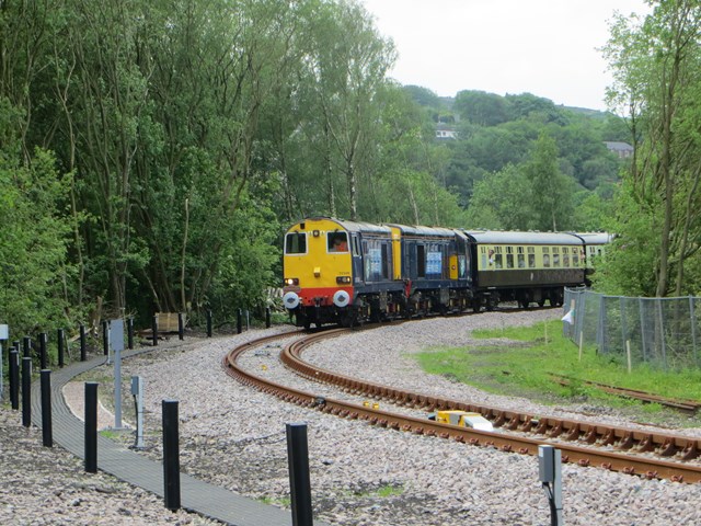 One of the first trains to use the completed Todmorden Curve