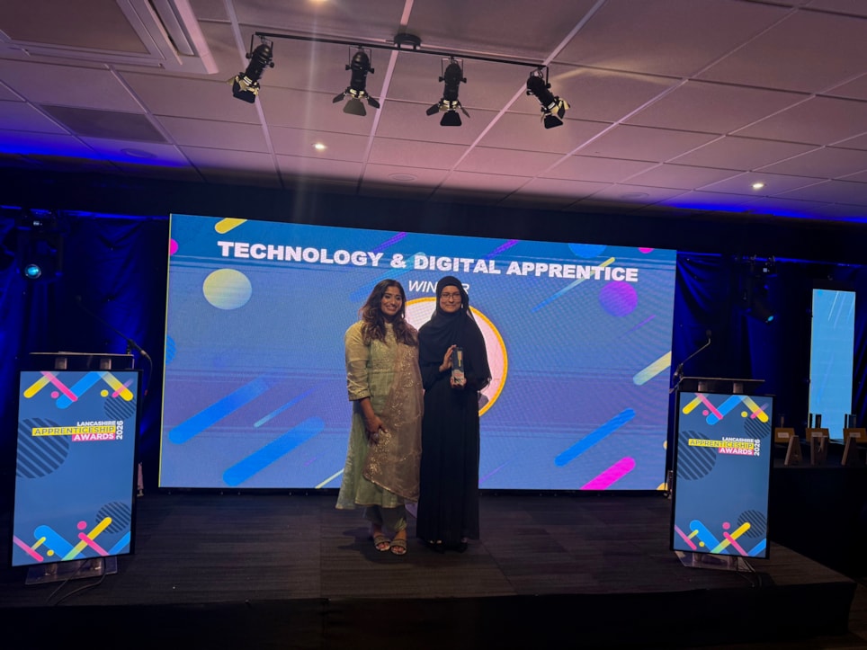 Apprentice Aaliah Mohamed receiving her award