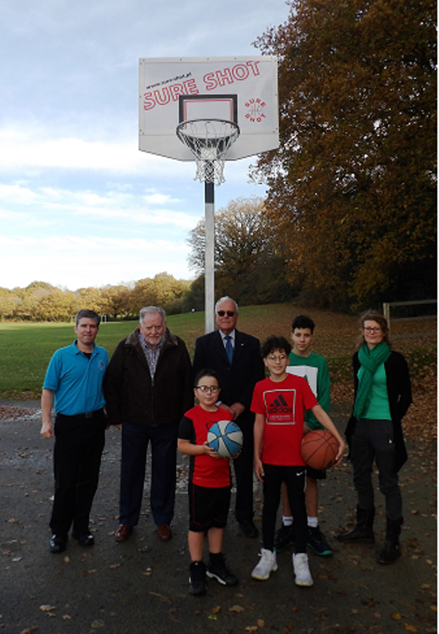 Basketball: Shooting hoops:  from left; Adrian Gaylon, Rother's sports development officer, Cllr JIm Carroll, Rother's cabinet member for young people, sport and leisure, Dave Miles president of the Rotary Club of Senlac and Rebecca Owen, Rother's parks manager, with keen basketball player Rueben, who requested the goals and brothers Stanley and Eli