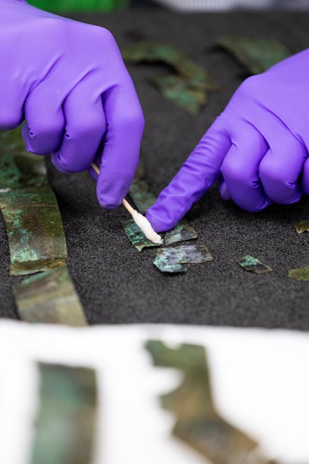 Conservator Bethan Bryan working on the Roman arm guard. Photo (c) Duncan McGlynn (3)