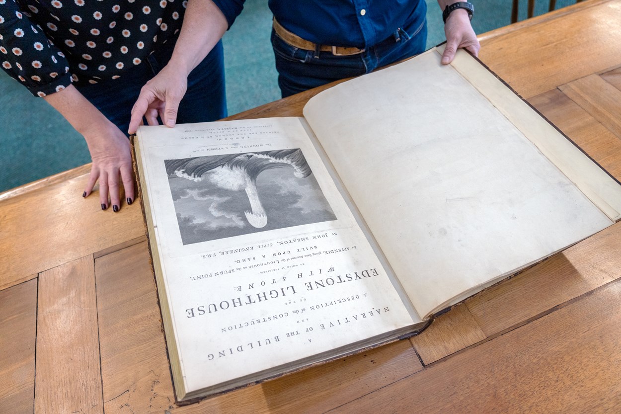 Engineery: Pages from the book containing original plans for John Smeaton's famous Eddystone Lighthouse. The beautiful first edition, penned by Smeaton himself, is on loan from Leeds Central Library, and is among the fascinating objects featured in Engineery, a new exhibition which has opened at Leeds Industrial Museum. Image credit: Anthony Robling.