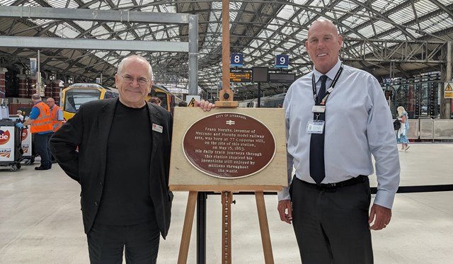 Peter, Lord Hendy of Richmond Hill, chair of Network Rail and Phil James Network Rail North West route director at Lime Street station with Frank Hornby plaque 23 June 2023
