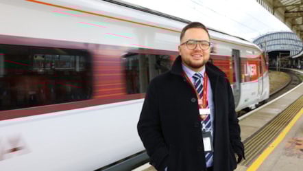 Carter Goodby BEM in front of an LNER Azuma train