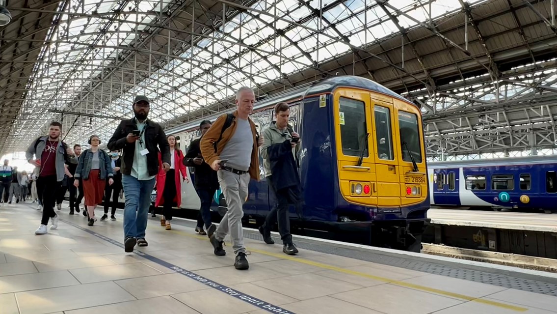 Railway open for August Bank Holiday rush as Network Rail delivers upgrades to improve passenger journeys: Manchester Piccadilly passengers on platform June 2022-2