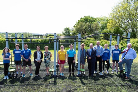 Pupils, teachers and Council officers at the new Outdoor Gym at Ysgol Greenhill
