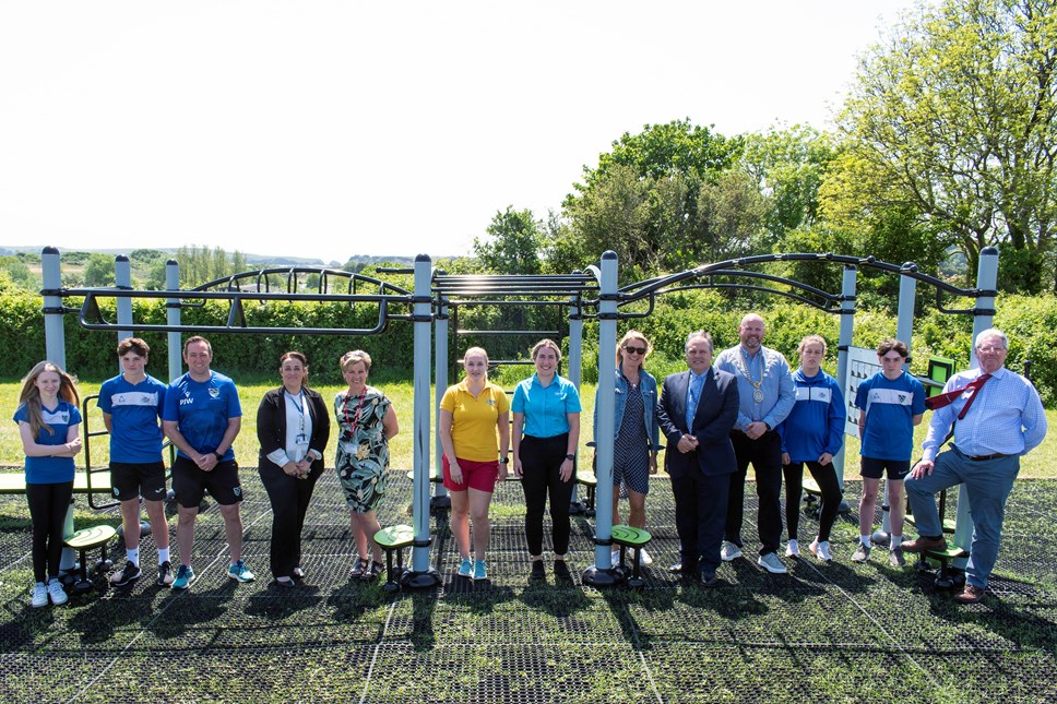 Pupils, teachers and Council officers at the new Outdoor Gym at Ysgol Greenhill