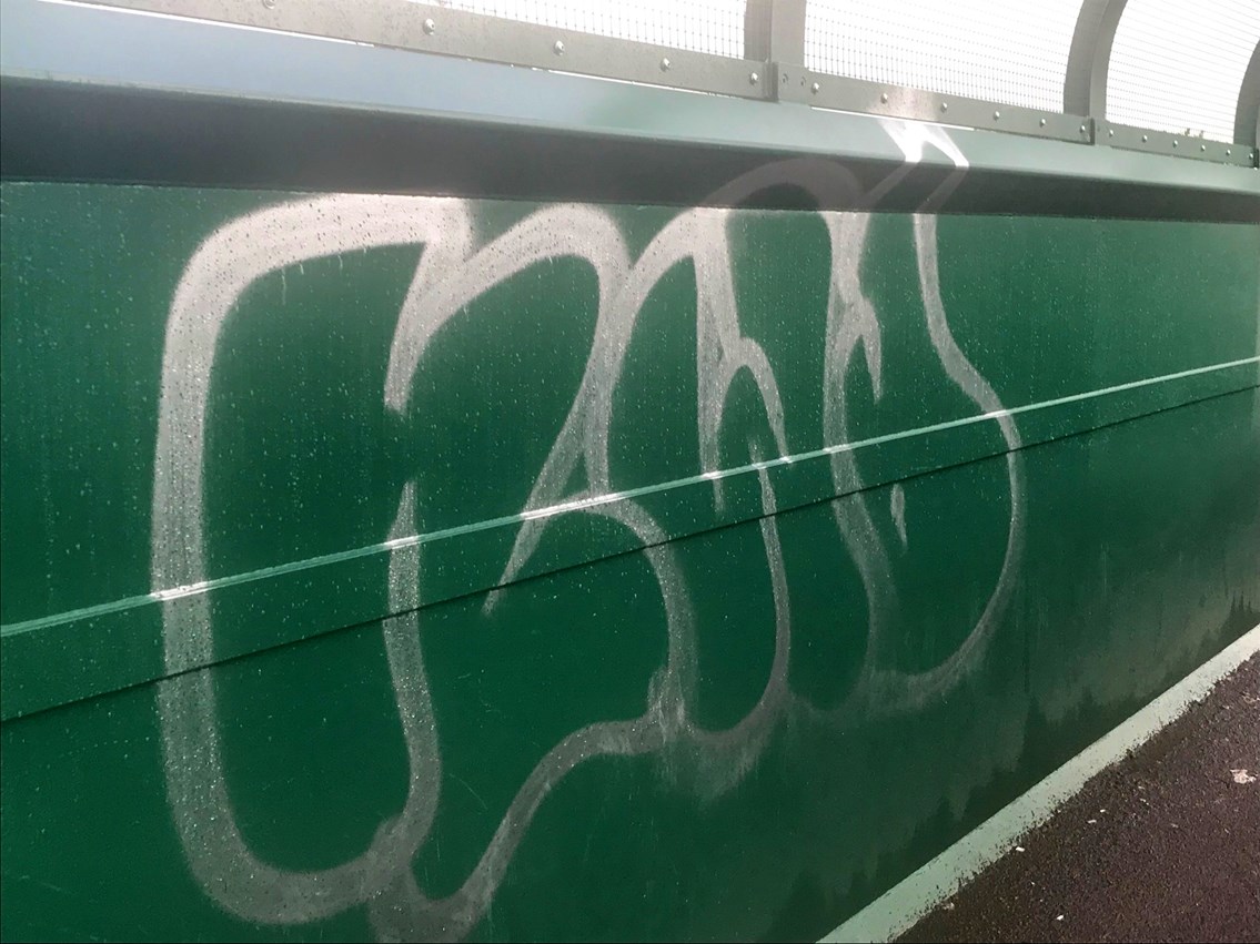 Mossley Hill footbridge graffiti damage 2