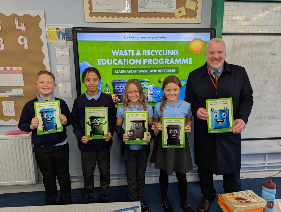 Cllr Damian Corfield with pupils at Russells Hall Primary School