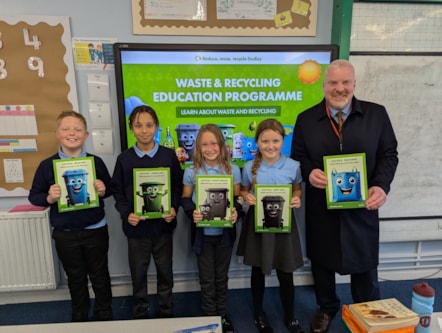 Cllr Damian Corfield with pupils at Russells Hall Primary School