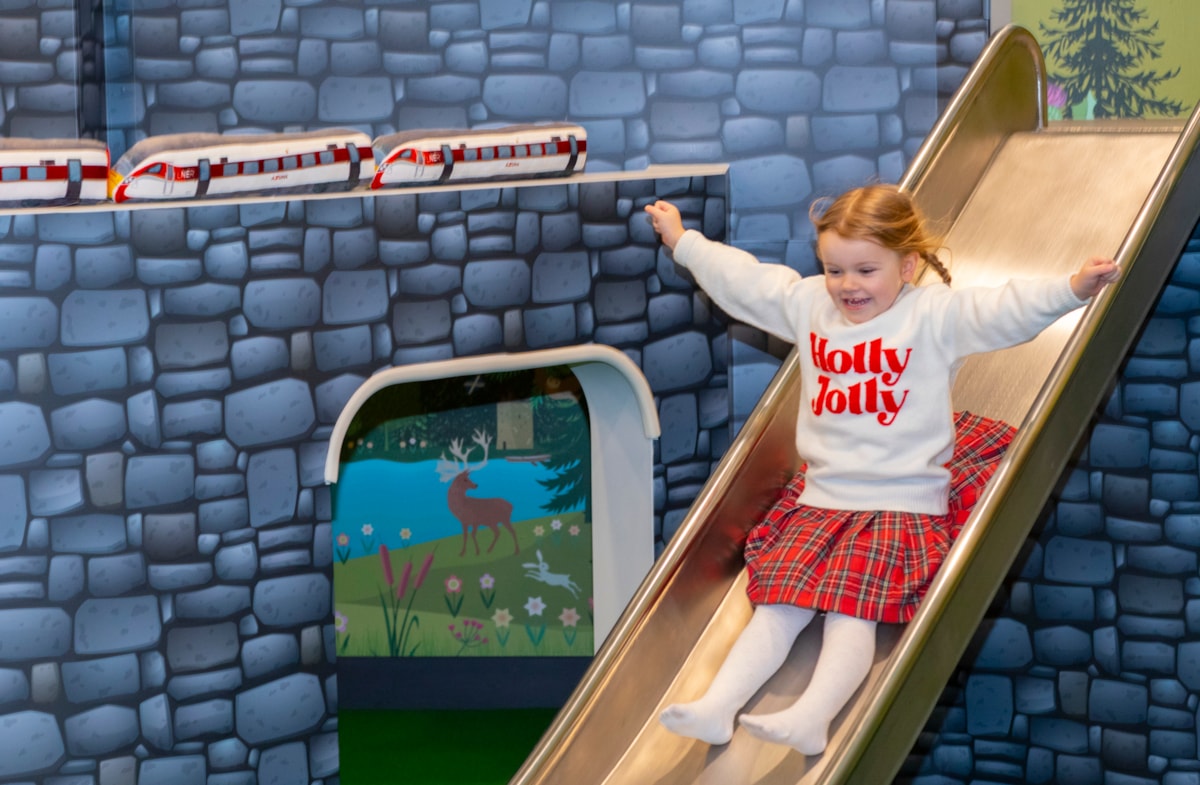 A child playing in the new LNER Family Lounge at Edinburgh Waverley-2