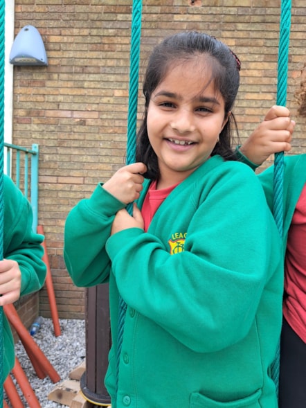 Pupil Samaira in the new sensory garden at Lea Community Primary School