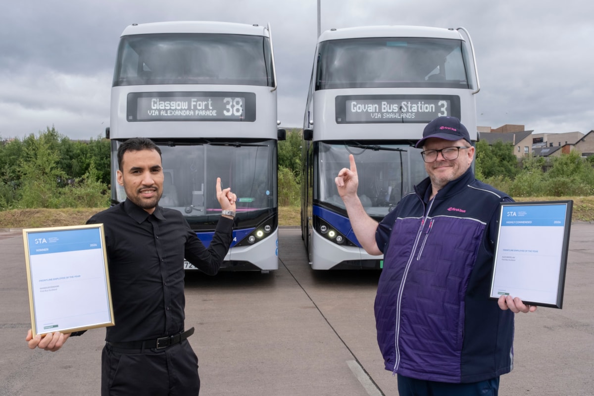 Mansour (left) and Alex show off their awards 2