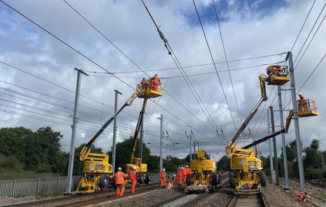 Passengers reminded to check before travelling as further upgrade work takes place to Midland Main Line in March: Engineers installing overhead lines as part of the Midland Mainline Upgrade, Network Rail