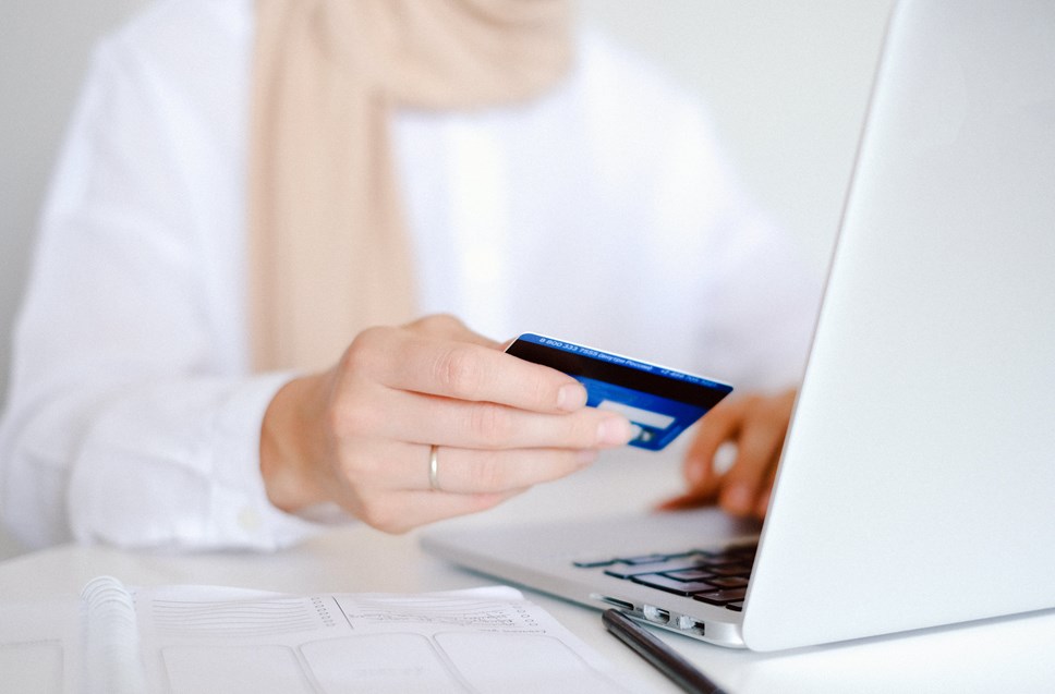 Person shopping on a laptop