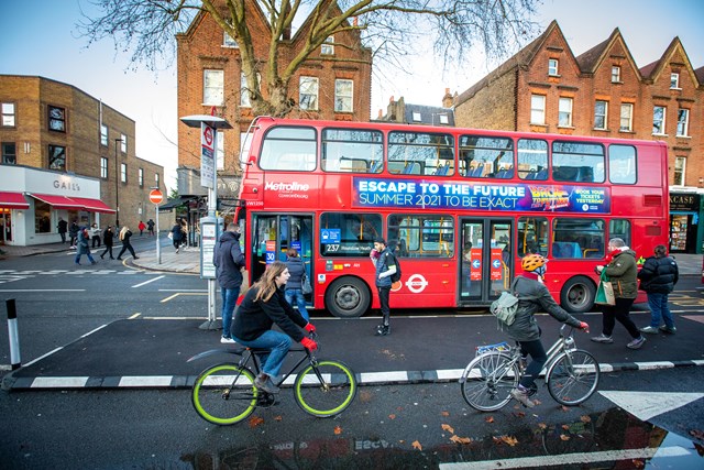 TfL image - 'People cycling on a new route in Chiswick'.