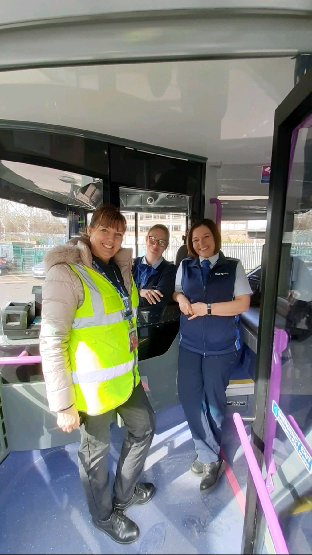 Denise Harrison with colleagues on the bus