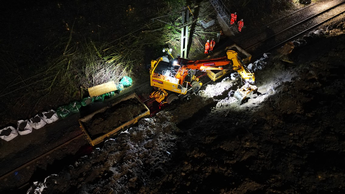 Specialist rail vehicles work to remove soil from landslip in Baildon, Network Rail (1)