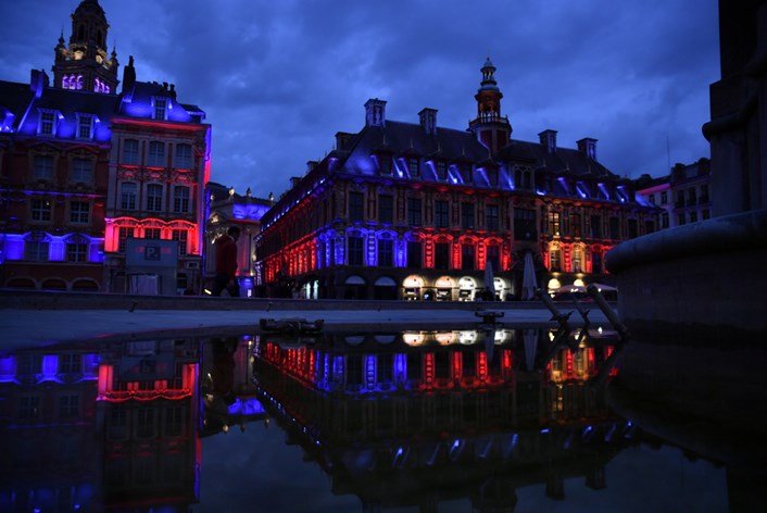 Lille tribute 1: Prominent locations in Lille are lit up in the colours of the United Kingdom's flag to mark the Queen's funeral.