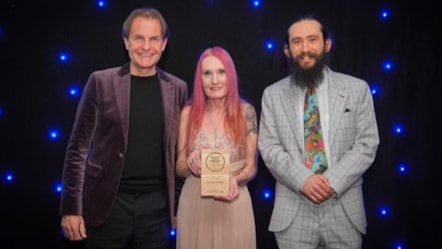 Customer advisor Charlie Jones, director Emma Stuart, and collections engagement assistant Phill Brant-Simmons with the Silver Award