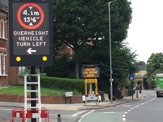 Hi-tech warning signs at South London railway bridge reduce bridge strikes by a third and cut delays to trains: Thurlow Park warning sign