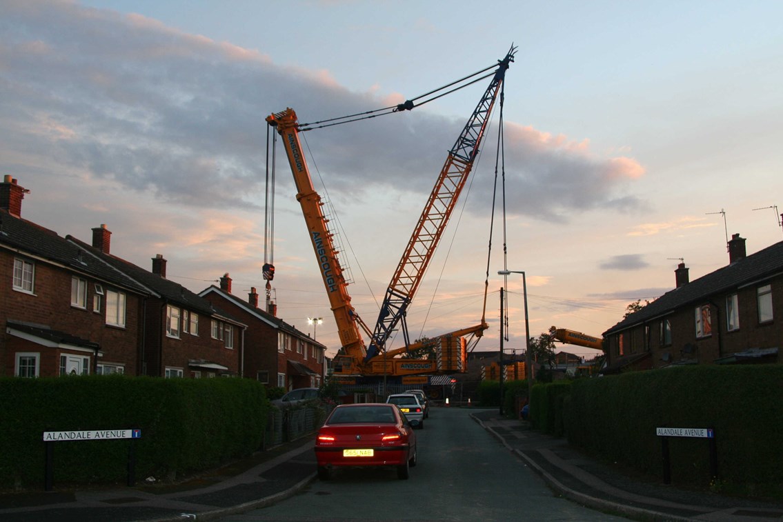 Trent Valley 4 Tracking Project: A 1000 tonne crane prepares to lift out the temporary road bridge at Lichfield Road, Armitage with Handacre