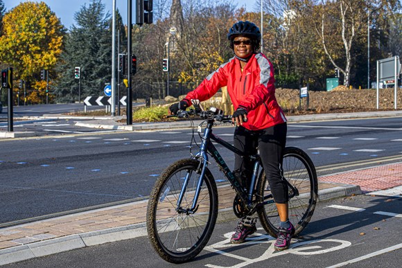 Person with bike using Moortown Roundabout