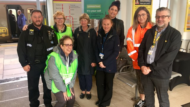 Staff who took part in the World Mental Health Day event at Ormskirk station: L-R, PC Pattison (BTP), Margaret (Samaritans), Chris (Samaritans), Jilly (Samaritans), Kelly (mental health nurse), Alex (Network Rail), Chelsea (Network Rail), Lee (Merseyrail)