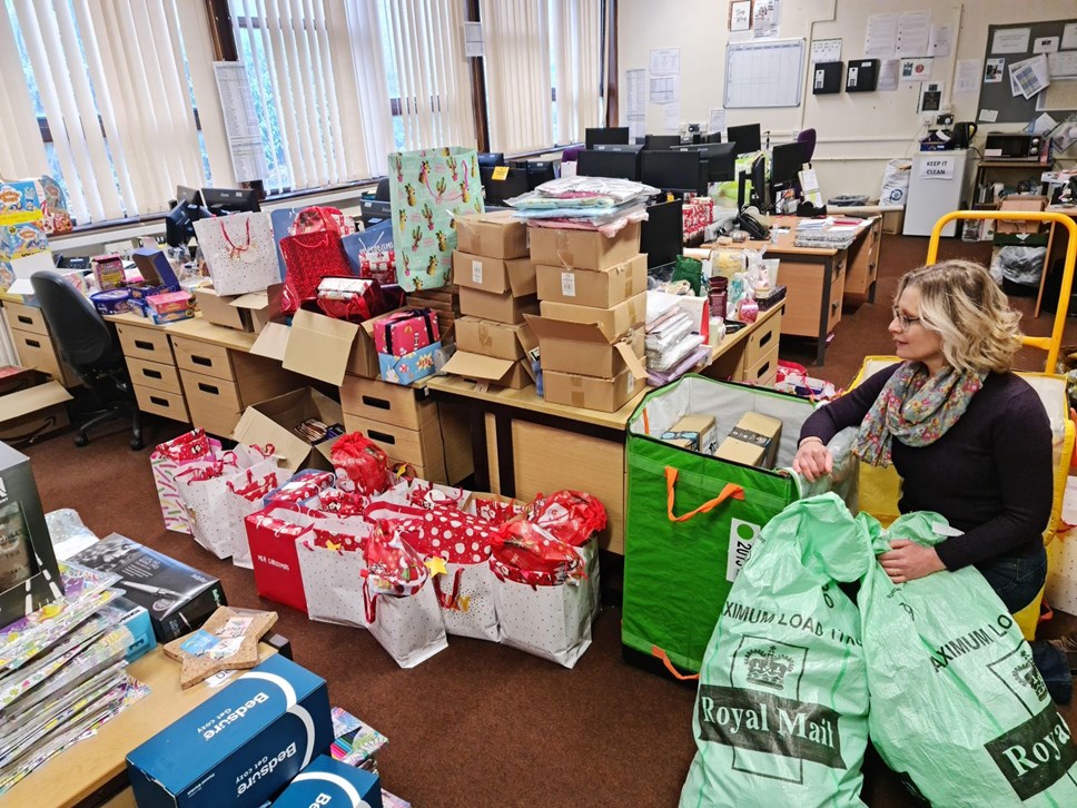 Councillor Buttery helping the Christmas Wish List collection