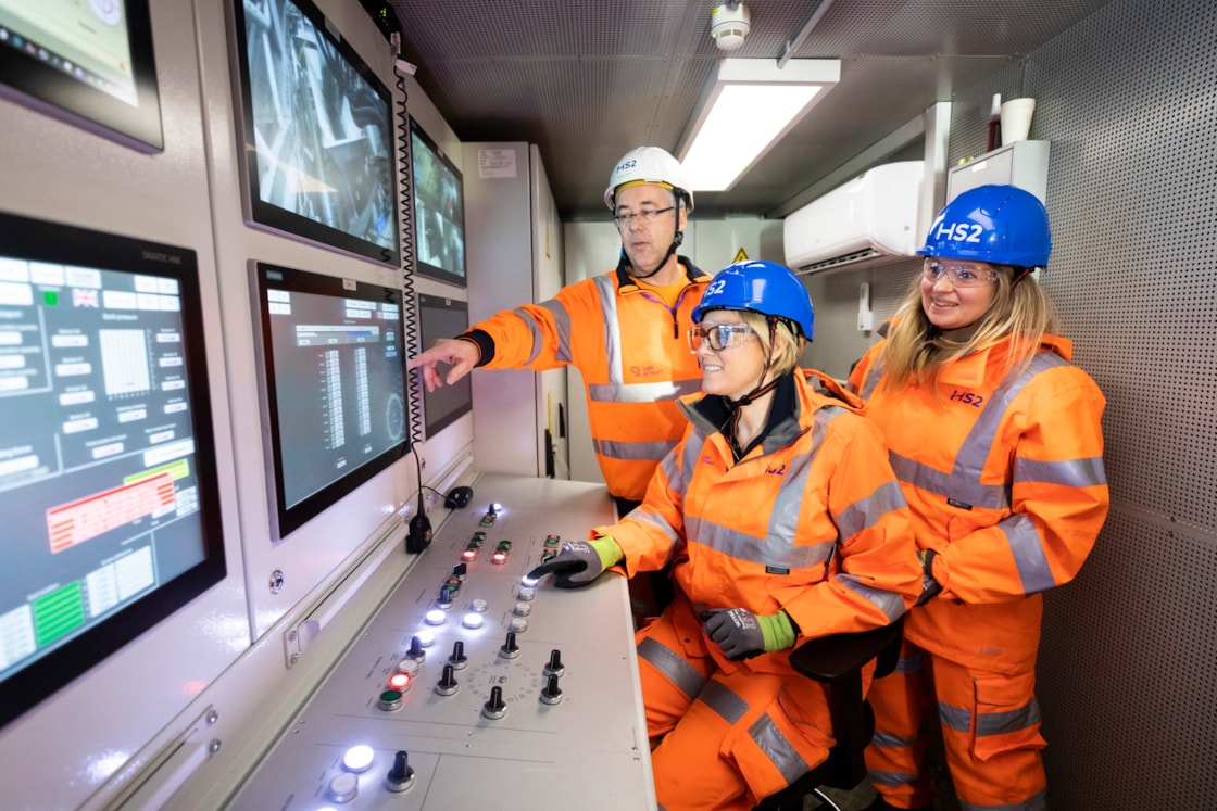 Train drivers launch TBM Karen building the Euston Tunnel: L-R: Michael Wilson, TBM driver; Vicky Knight, train driver; Hayley Richardson, train driver