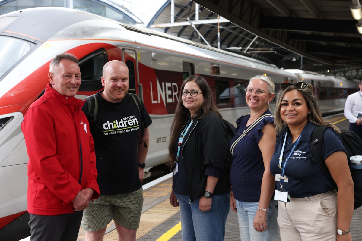 LNER, BTP and other train operator colleagues joining with Railway Children to raise awarness on board LNER Azuma