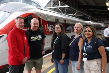 LNER, BTP and other train operator colleagues joining with Railway Children to raise awarness on board LNER Azuma