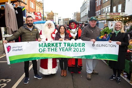 Islington Market Trader of the Year 2019 - (L-R) Racheed Muhammed of Sunny's Olive Tree, Santa, Serpil Erce, the Mayor of Islington Cllr Rakhia Ismail, Dave Jackson and Christine Lovett, chief executive of Angel.London