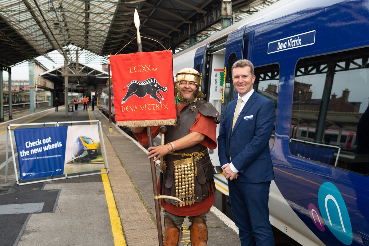 David Brown (Northern MD) is joined by a Roman soldier from Roman Tours Deva Victrix at the launch of new trains for Chester.