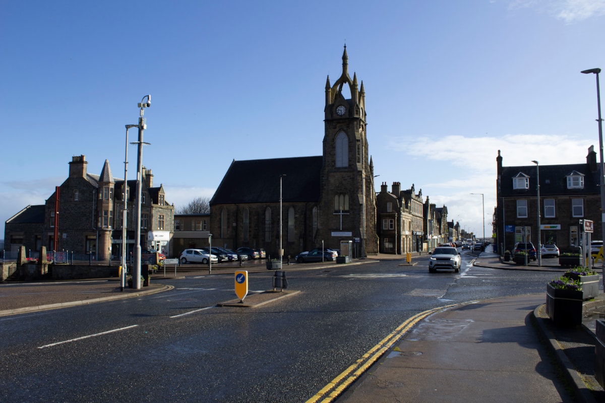 Car driving on Cluny Square in Buckie.